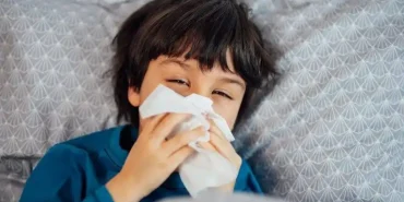 little-child-boy-blowing-his-nose-sick-child-with